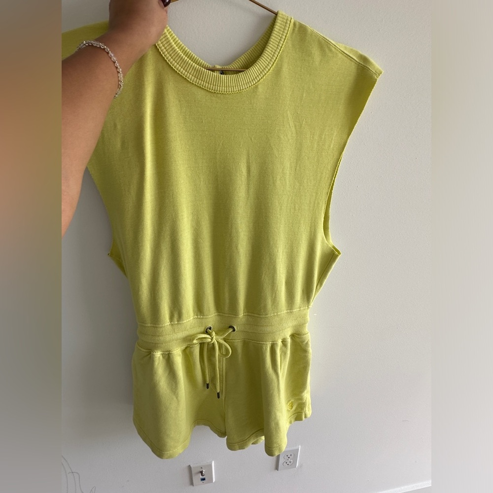 Free People jumpsuit in yellow . Brand new . Unworn